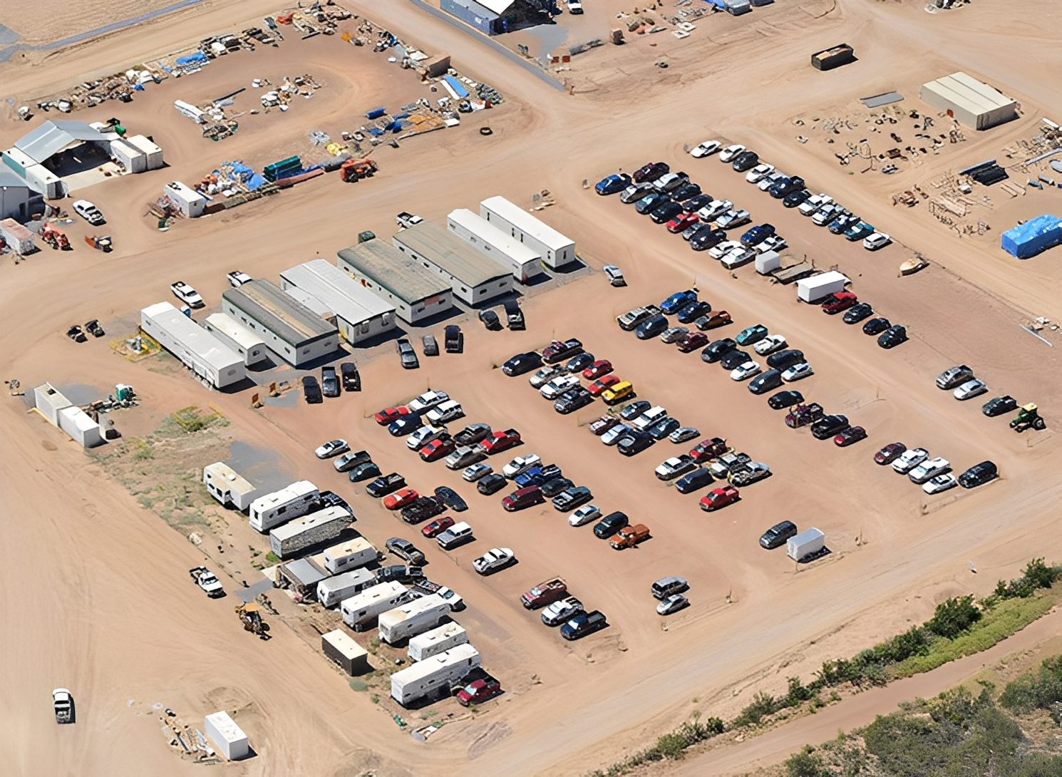 Aerial view of parking lot and buildings.