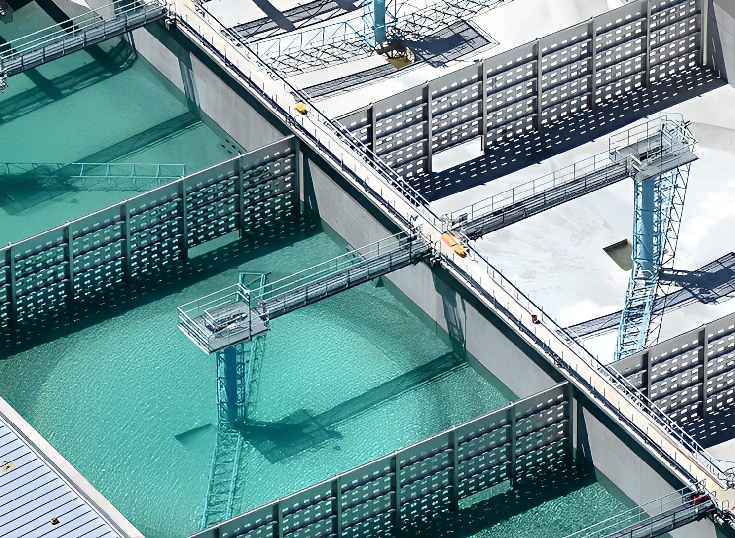 Water treatment facility with large filtration tanks.